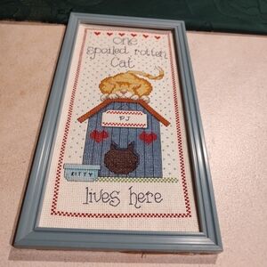 beautiful 7"x13" framed cross stitch piece is a must-have for any cat lover.
